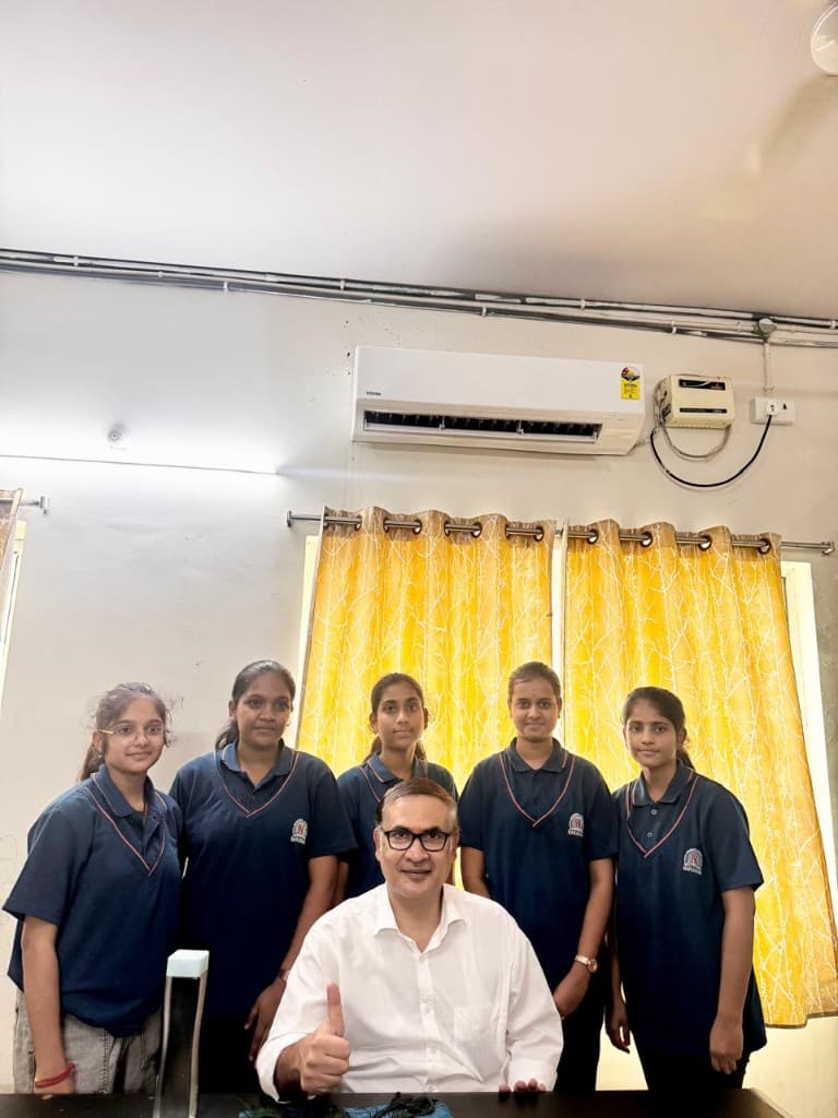 Mentor session with girl students in classroom